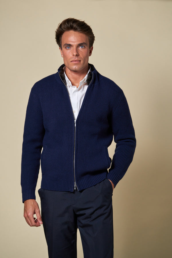 Genuine Fur Collar Blouson in navy ribbed Australian merino wool with a genuine rabbit fur collar, worn open over a white shirt